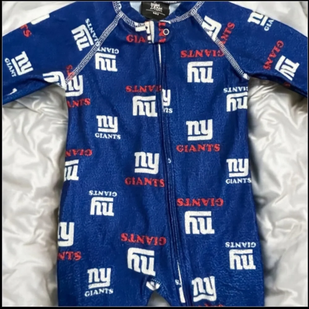 NFL Team Apparel Giants Blue and Red Kids One Piece Footie Pajamas - Picture 2 of 7
